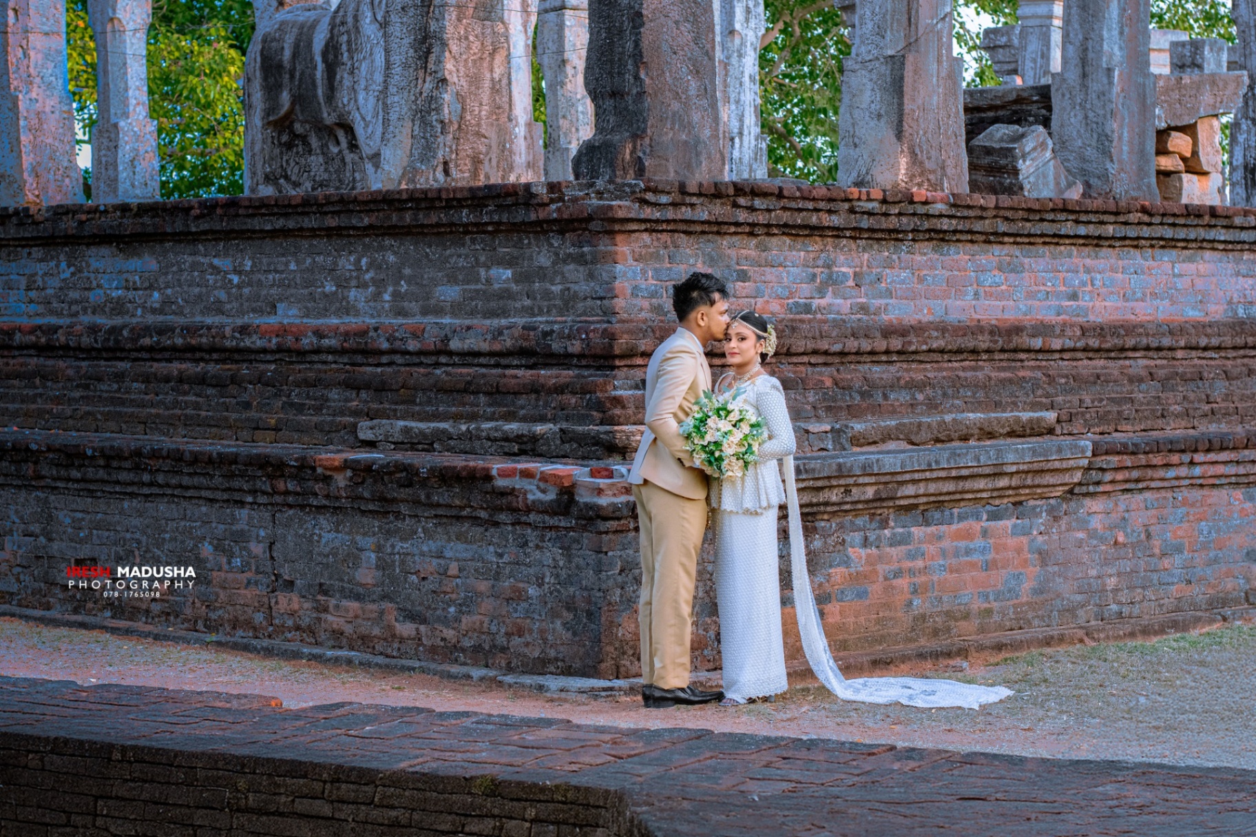 Wedding couple at ancient temple ruins